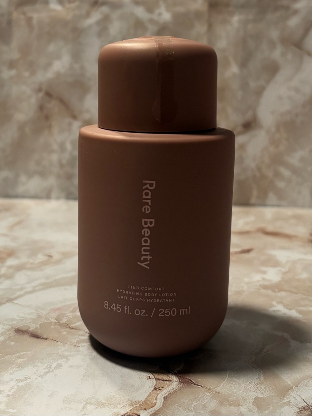 Rare Beauty Hydrating body — Brown